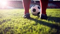 Soccer or football player standing with ball on the field for Ki Royalty Free Stock Photo