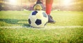 Soccer or football player standing with ball on the field for Ki Royalty Free Stock Photo