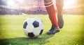 Soccer or football player standing with ball on the field for Ki Royalty Free Stock Photo