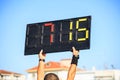 Soccer football referee assistant with board substitution Royalty Free Stock Photo