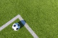 Soccer football sport background. Soccer ball on green artificial grass turf field with white line. Top view Royalty Free Stock Photo