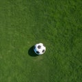 Soccer football sport background. Soccer ball on green artificial grass turf field. Copy space Top view. generative ai Royalty Free Stock Photo