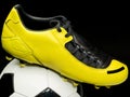 Soccer footwear on ball Royalty Free Stock Photo