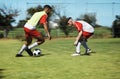 Soccer, friends and training and workout with men playing on a sports field, competitive training for sports goal. Ball
