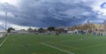 Soccer Game Day Under Stormy Skies at Local Community Field Royalty Free Stock Photo