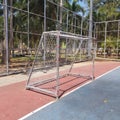 Soccer goal post on concrete floor at stadium Royalty Free Stock Photo