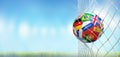 Soccer goal soccer ball with flags in net at soccer stadium 3d r Royalty Free Stock Photo