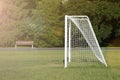 Soccer goal. View of the net on an empty football field. Football goal on the football field on the side. Royalty Free Stock Photo