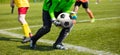 Soccer Goalkeeper Holding Soccer Ball. Soccer Goalkeeper Catching Skills Royalty Free Stock Photo