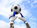 Soccer goalkeeper's hands reaching for the ball