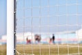 Soccer goalpost and players training