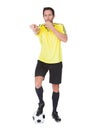 Soccer judge whistling Royalty Free Stock Photo