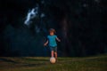 Soccer kid. Kids play football on outdoor stadium field. Little boy kicking ball. School football sports club. Training Royalty Free Stock Photo
