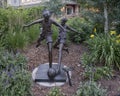 `Soccer Kids`, a bronze sculpture by Dennis Smith in Avon, Colorado. Royalty Free Stock Photo