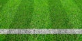 Soccer line in green grass of soccer field. Green lawn field pattern for sport background