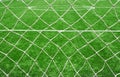 Soccer net on green grass Royalty Free Stock Photo