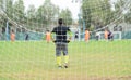 Soccer net on green grass Royalty Free Stock Photo