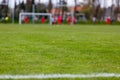 Soccer pitch with blurred players Royalty Free Stock Photo