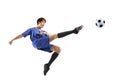 Soccer player in action isolated white background Royalty Free Stock Photo