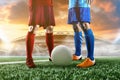 Soccer player in action kick ball at stadium. Royalty Free Stock Photo