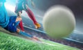 Soccer player in action kick ball at stadium. Royalty Free Stock Photo