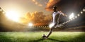 Soccer player in action on sunset stadium panorama background Royalty Free Stock Photo