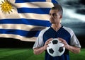 soccer player with ball on his hand in the field. storm. flag behind Royalty Free Stock Photo