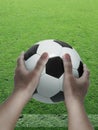Soccer player with ball in his hands on field Royalty Free Stock Photo