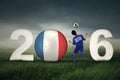 Soccer player with ball and numbers 2016 Royalty Free Stock Photo