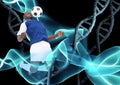 Soccer player with ball and with stone dna chains and black background and blue lights Royalty Free Stock Photo