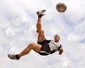 Soccer player in a bicycle kick Royalty Free Stock Photo