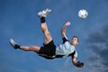 Soccer player in a bicycle kick Royalty Free Stock Photo