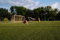 Soccer player celebrating goal on a soccer stadium.Soccer player does a backflip