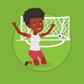 Soccer player celebrating scoring goal. Royalty Free Stock Photo