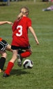 Soccer Player Chasing Ball