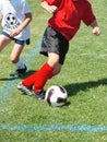 Soccer Player Chasing Ball Royalty Free Stock Photo