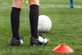 Soccer Player Footballer Sportsman on Training Field. Young Soccer Player on Practice Pitch Royalty Free Stock Photo