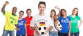 Soccer player from Germany with fans from other countries Royalty Free Stock Photo