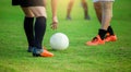 Soccer player get the ball or placing the ball to free kick or penalty kick Royalty Free Stock Photo