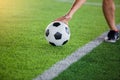 Soccer player get the ball or placing the ball to free kick Royalty Free Stock Photo