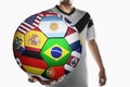 A soccer player holding world soccer ball Royalty Free Stock Photo
