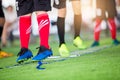 Soccer player Jogging and jump between marker for football training. Ladder Drills Exercises. Royalty Free Stock Photo
