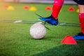 Soccer player jump and stomp for trap and control football with Royalty Free Stock Photo