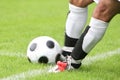 Soccer player kicking ball Royalty Free Stock Photo