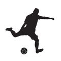 Soccer player kicking ball, isolated silhouette