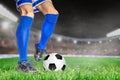 Soccer Player Kicking Football in Outdoor Stadium With Copy Space Royalty Free Stock Photo