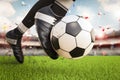 Soccer player kicking soccer ball in motion Royalty Free Stock Photo