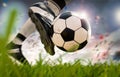 Soccer player kicking soccer ball in motion Royalty Free Stock Photo