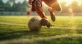 a soccer player kicks a ball on the field Royalty Free Stock Photo