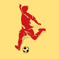 Soccer player kicks on the ball, red silhouette on a beige background, Royalty Free Stock Photo